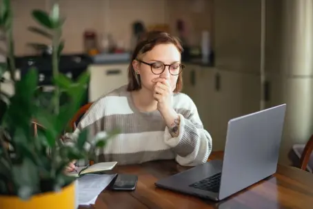 Woman reviewing financial documents