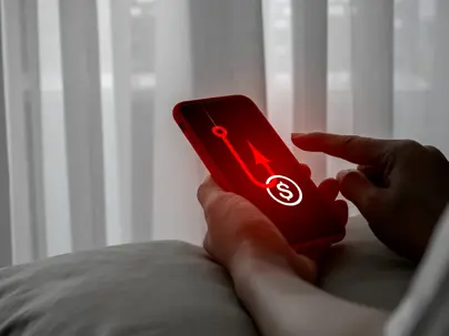 cammer attack with benefit phishing concept. Coin with hook, cryptocurrency or financial scams tactic, showing on mobile phone screen in victim hands who online, social networking, often cyberattack.