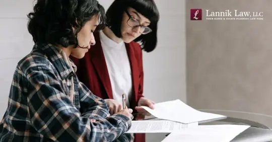 person talking to a lawyer about probate