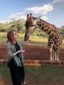 Woman feeding the animals
